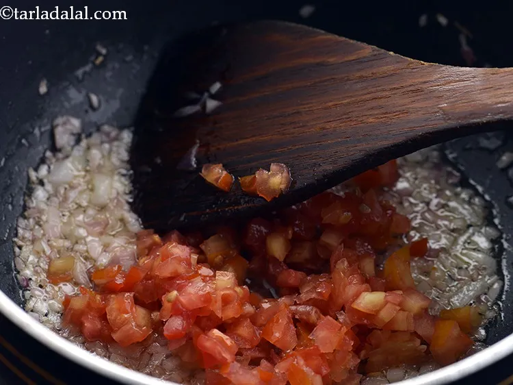 Step 25 – Add tomatoes. You can even make use of tomato puree or fresh tomato pulp.