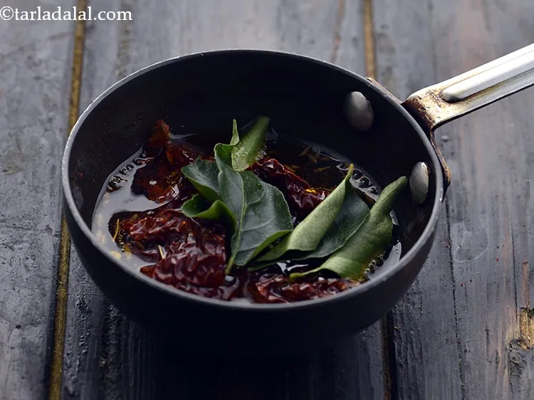 Step 32 – Add the curry leaves.