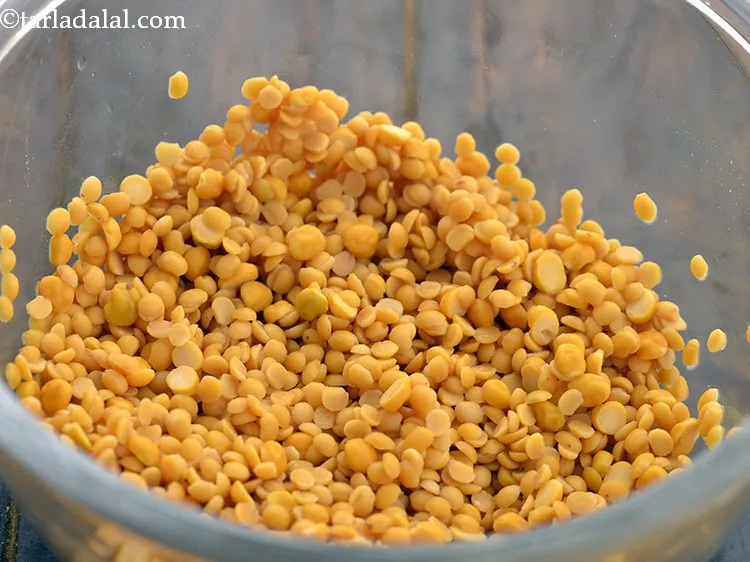 Step 10 – Drain the dirty water and pour fresh water to dal.&nbsp;