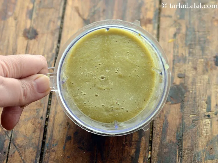 Step 28 – Transfer the mixture of <strong>moong dal mixed vegetable soup</strong> into a mixer jar and blend …