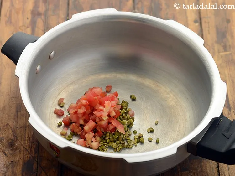 Step 20 – Then add the chopped tomatoes.