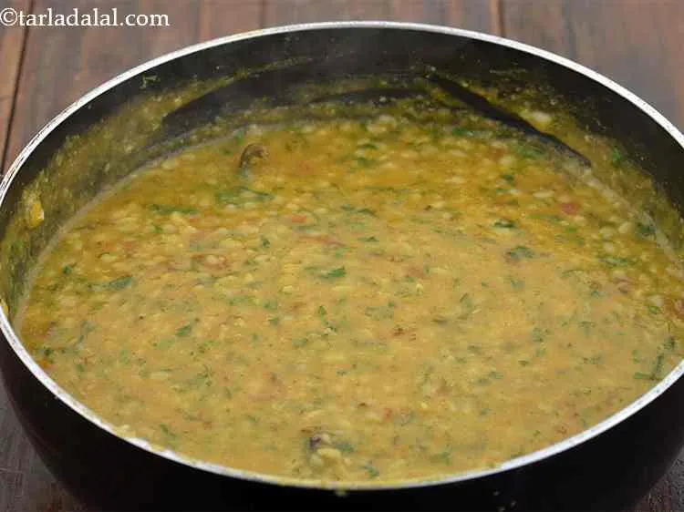 Step 17 – Along with it add fresh coriander and ? of cup water, mix well and cook …