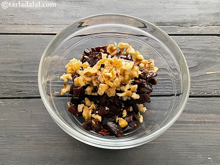 Step 4 – Add finely chopped walnuts (akhrot).&nbsp;&nbsp;Eating a handful of&nbsp;<a href="https://www.tarladalal.com/recipes-using-walnuts-784">Walnuts</a>&nbsp;a day is said to increase the<a …