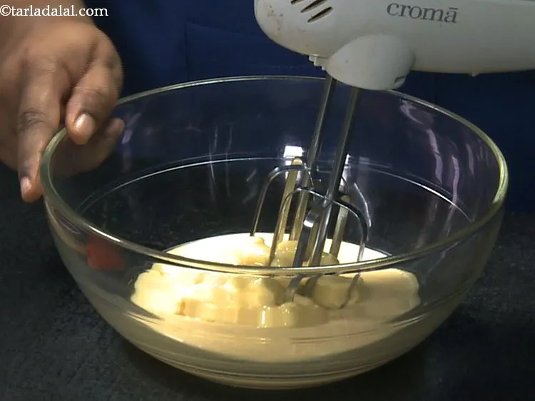 Step 15 – Beat it using an electric beater till smooth and fluffy.