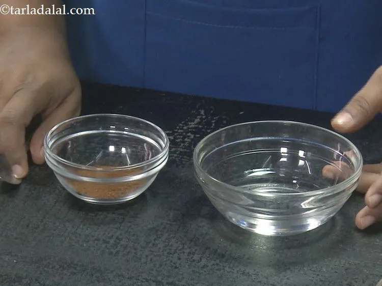 Step 5 – In a deep bowl, take instant coffee powder.