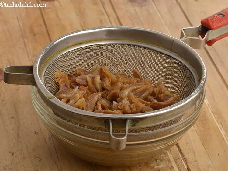 Step 12 – Drain the dates and keep aside.