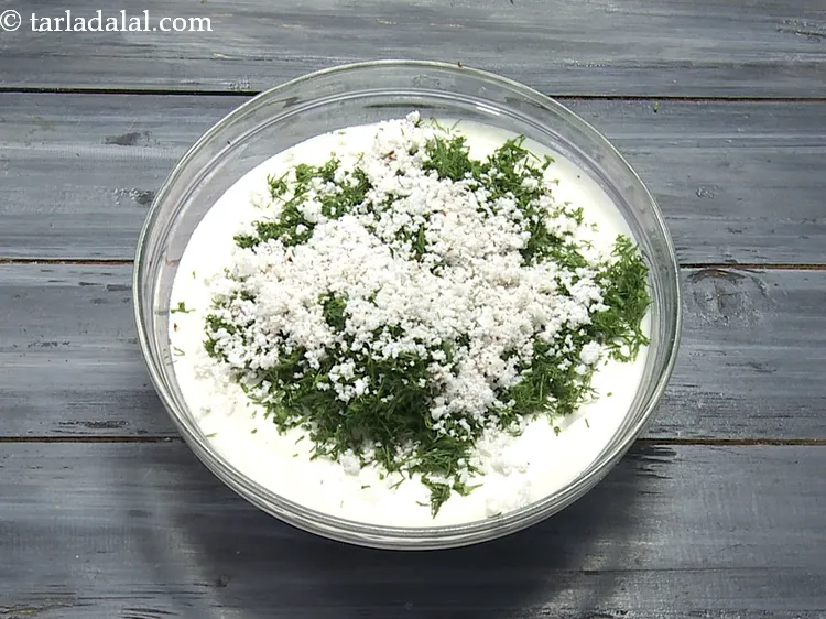 Step 16 – Add 1/4 cup&nbsp;<a href="https://www.tarladalal.com/glossary-grated-coconut-852i">grated coconut</a>.
