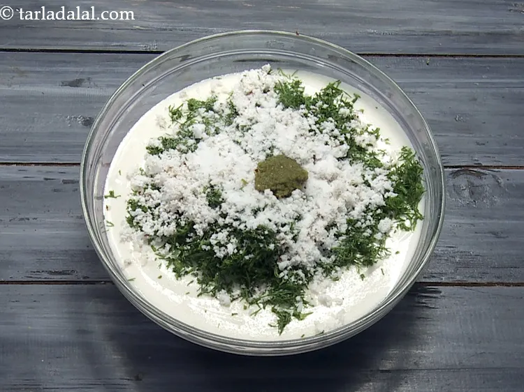 Step 18 – Add 1 tsp&nbsp;<a href="https://www.tarladalal.com/glossary-green-chilli-paste-hari-mirch-ki-paste-mirchi-paste-333i">green chilli paste</a>.