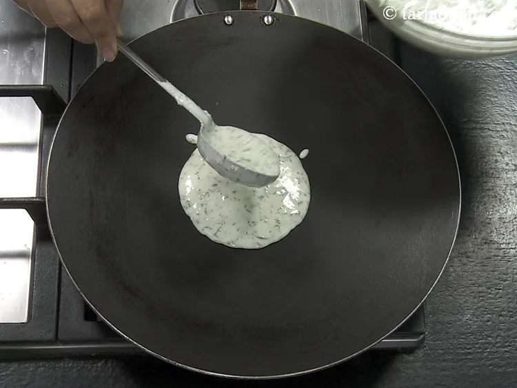 Step 25 – Pour a ladleful of the batter on it.