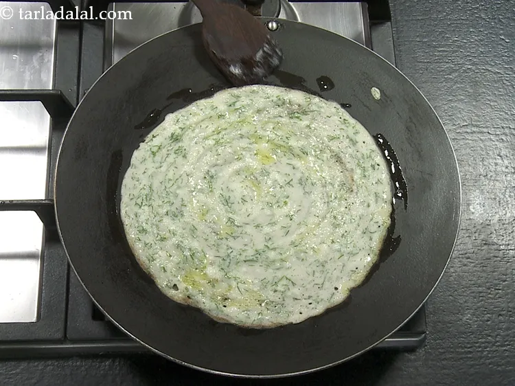 Step 28 – Cook on a medium flame for 2 minutes till the dosa turns golden brown in …