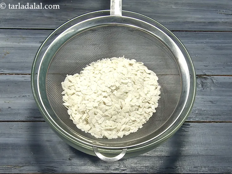 Step 4 – Add 1/2 cup&nbsp;<a href="https://www.tarladalal.com/glossary-beaten-rice-poha-rice-flakes-flaked-rice-536i">beaten rice (poha)</a>.