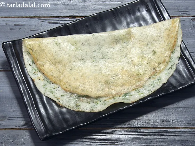 Step 31 – Dill dosa is ready. Repeat steps 4 to 9 to make 16 more dosas.