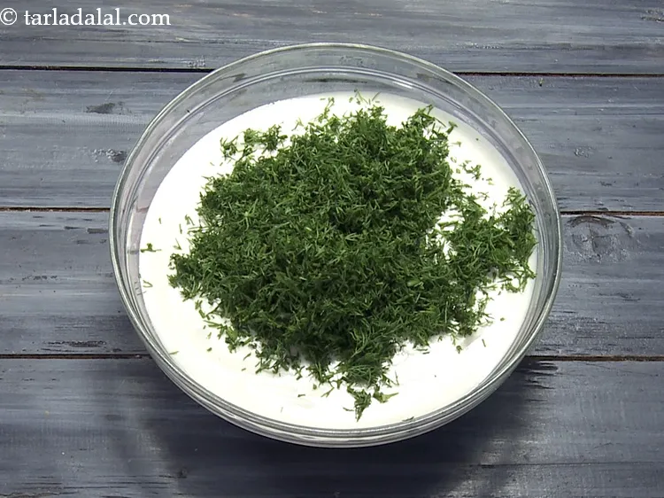 Step 15 – Add 1/2 cup&nbsp;finely&nbsp;<a href="https://www.tarladalal.com/glossary-chopped-dill-leaves-1849i">chopped dill leaves</a>.
