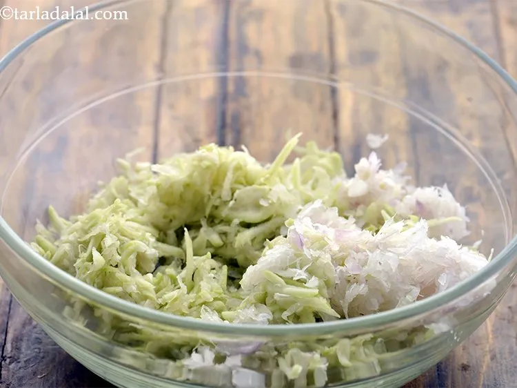 Step 3 – Transfer the drained doodhi and onions in a bowl. If you are Jain, skip adding …
