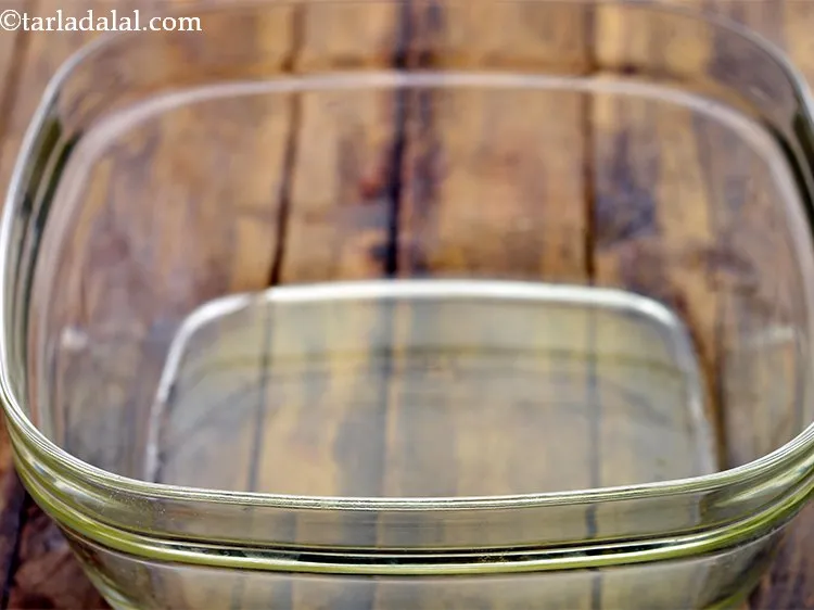 Step 25 – To prepare the tempering of <strong>bottle gourd dumplings</strong>, heat the oil in a deep microwave …