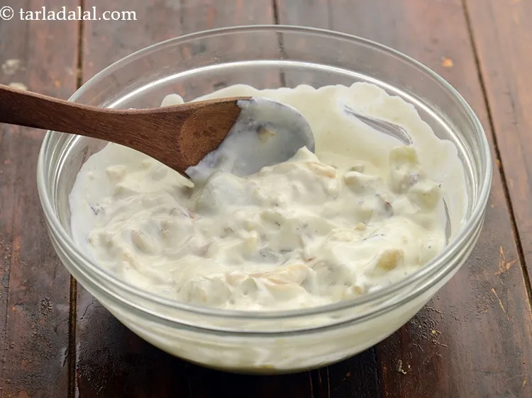 स्टेप 12 – एक बार ठंडा होने पर उसी कटोरे में दही और …