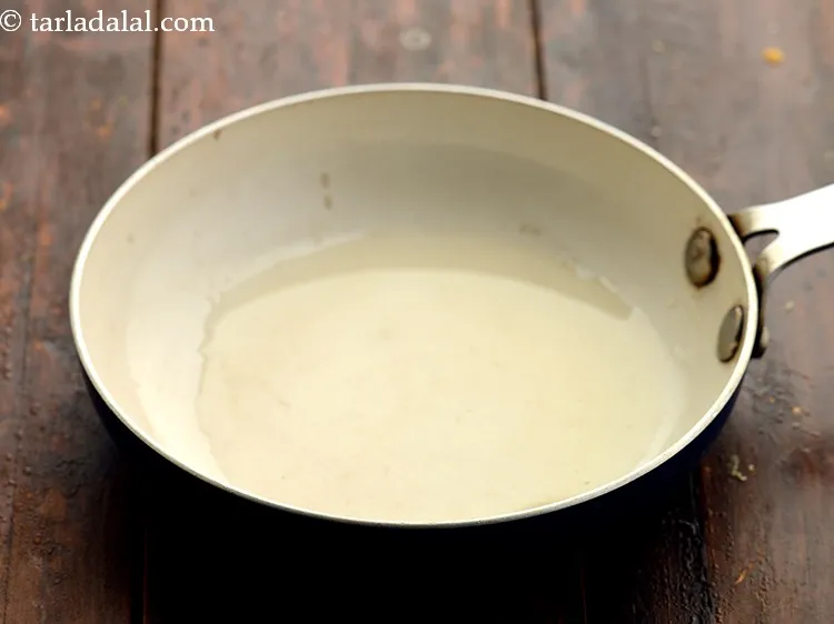 स्टेप 13 – एक छोटे नॉन-स्टिक पैन में नारियल तेल गरम करें। आप …