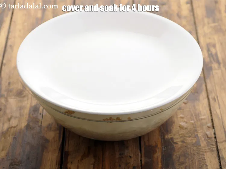 Step 7 – Enough water in a deep bowl and mix well. Cover with a lid and keep …