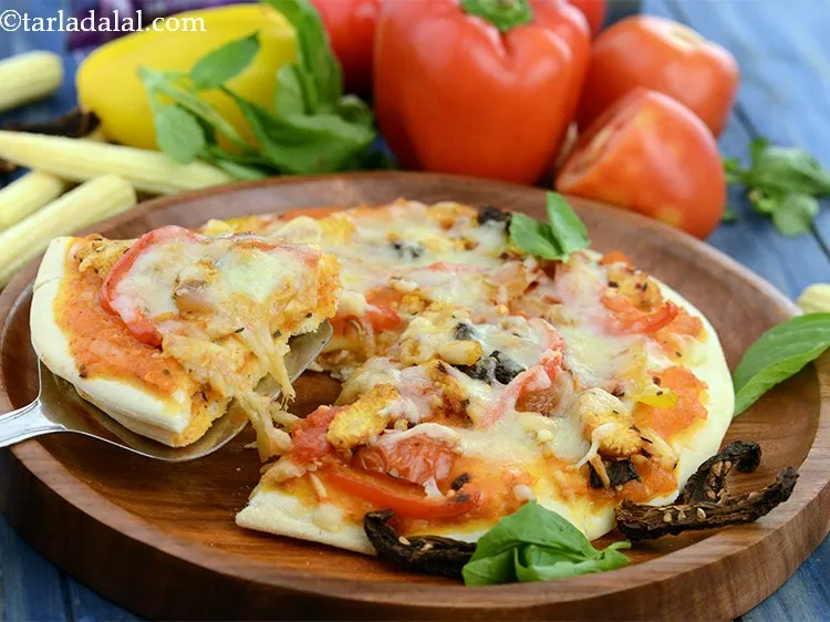 Step 22 – Serve the <strong>double layered cheese veggie crunch pizza</strong> immediately.