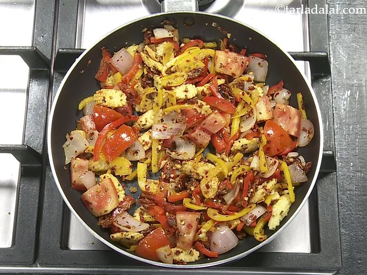 Step 11 – Mix well and cook on a medium flame for another 2 minutes, while stirring occasionally.