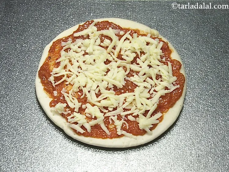 Step 15 – Sprinkle &frac14; cup of mozzarella cheese evenly over it. You can also make use of …