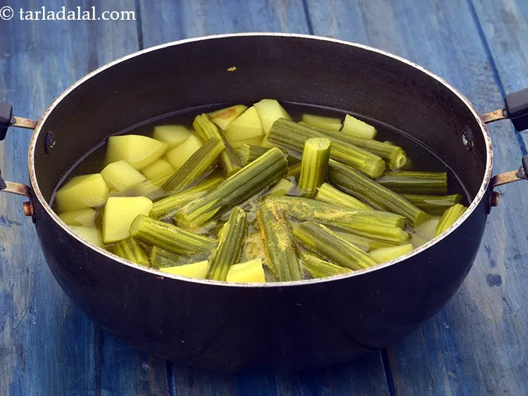 Step 9 – Mix well and cook on a medium flame for 10 minutes, while stirring occasionally. Once …