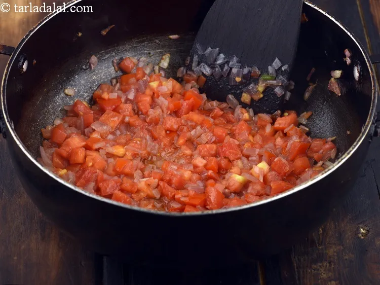 Step 13 – Add 1/2 cup&nbsp;finely&nbsp;<a href="https://www.tarladalal.com/glossary-chopped-tomatoes-779i">chopped tomatoes</a>.