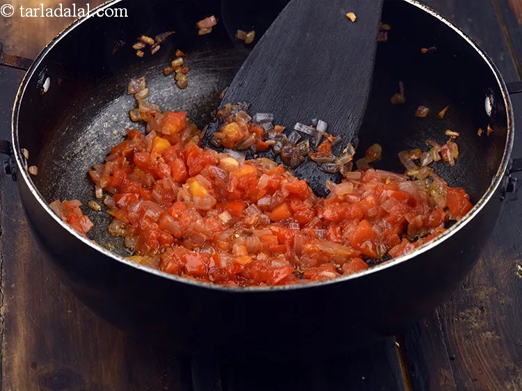 Step 14 – Mix well and cook on a medium flame for 2 minutes, while stirring occasionally.