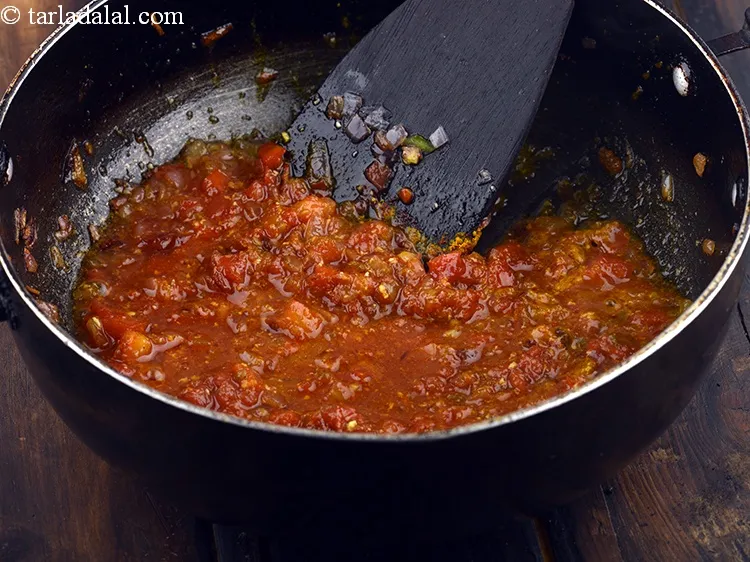 Step 23 – Mix well and cook on a medium flame for 30 seconds.