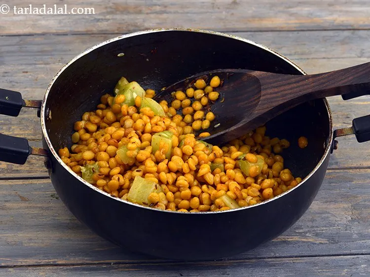 Step 33 – Mix well. Cover and cook on a medium flame for 3 minutes, while stirring occasionally. …