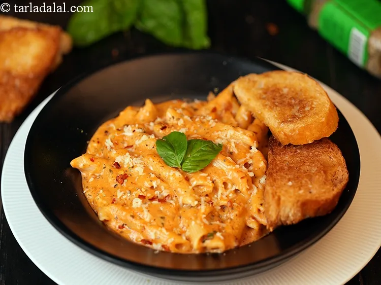 Step 49 – Serve pink sauce pasta immediately for better taste and flavour, it tends to become dry …