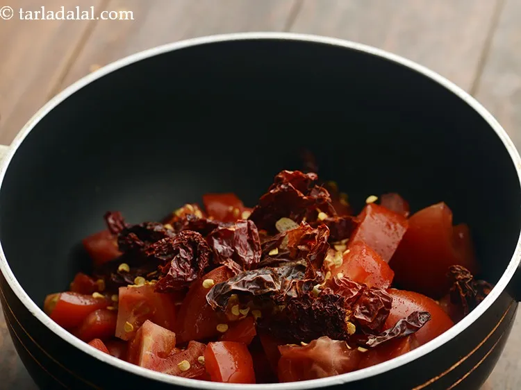 Step 4 – Add whole dry Kashmiri red chillies after removing the stalks. If they are very big …