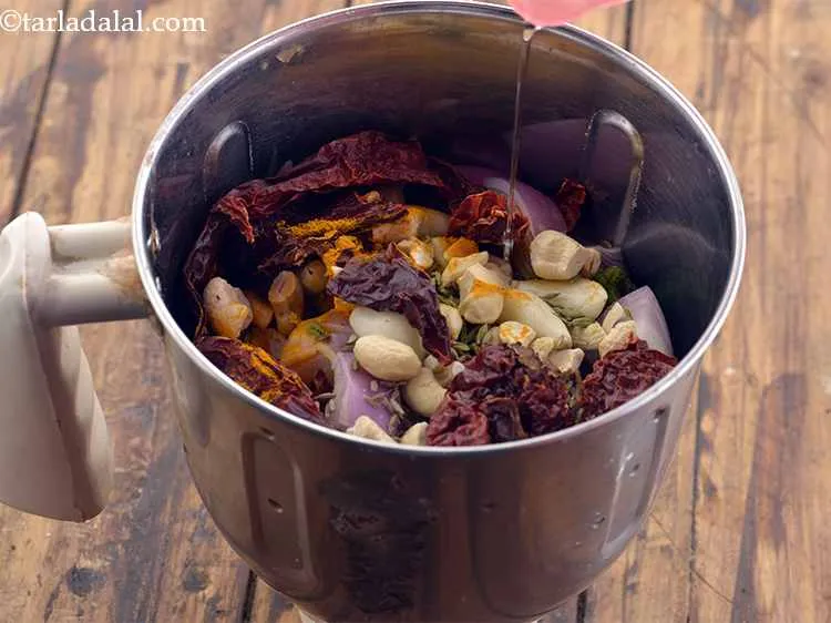 Step 25 – Now add&nbsp;&frac14;&nbsp; cup of water. This will help in blending the ingredients together easily.