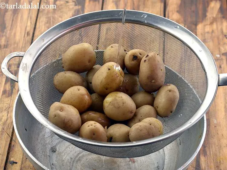 Step 4 – Drain the potatoes and discard the water.
