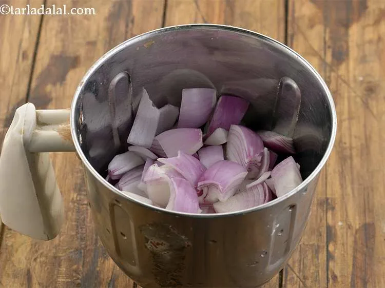 Step 2 – To prepare a smooth paste for<strong> dum aloo</strong>, in a mixer jar add roughly chopped …