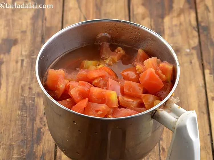 Step 14 – After it cools down , transfer the tomatoes to a mixer jar.