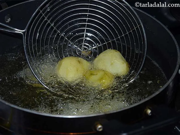 Step 8 – Fry them until they develop a golden brown color on the surface.