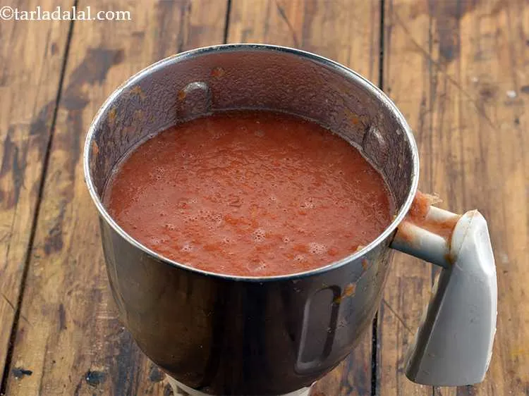 Step 15 – Blend the tomatoes to a smooth pur&eacute;e. Keep aside.