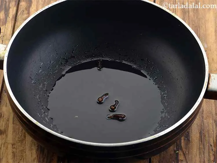 Step 21 – Add the cloves.