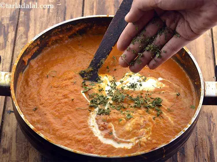 Step 39 – Add the kasoori methi. Crush the kasoori methi between your palms before you add it …