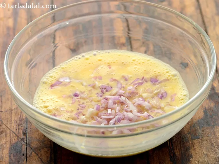 Step 18 – Add the finely chopped onions. We add them for pungency.