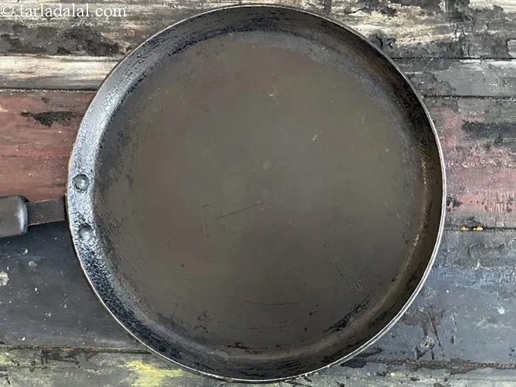 Step 14 – Take a non-stick tava( griddle) and heat it up.
