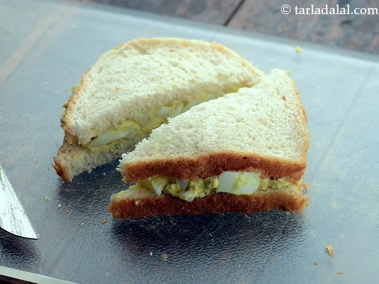 Step 12 – Cut the <strong>quick and easy egg sandwich</strong> diagonally, using a sharp knife. You can further …