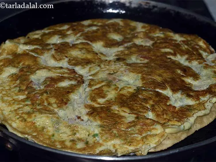 Step 27 – Turnover and cook again till the egg is completely cooked.