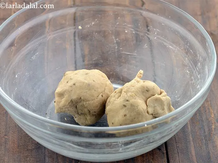 Step 7 – Divide the dough into 2 equal portions.