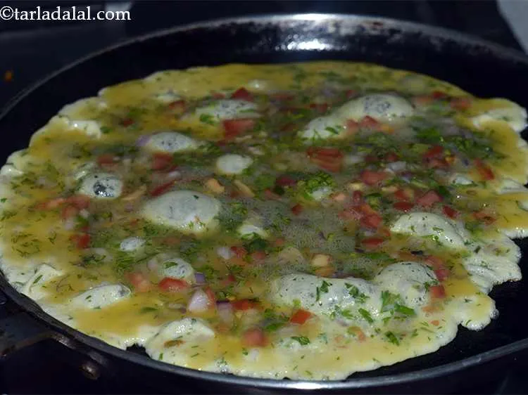 Step 24 – Put half of the egg mixture on it.