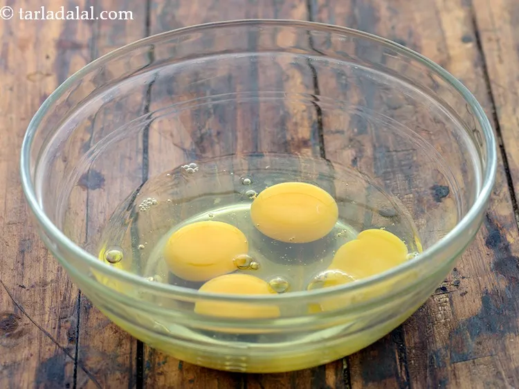 Step 21 – Break an egg in a small bowl.