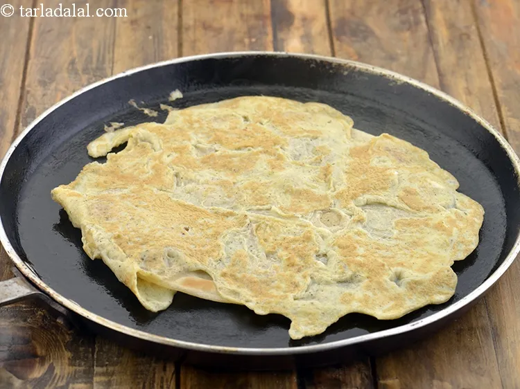 Step 27 – Cook on a medium flame for 2 minutes, turn over and cook on a medium …