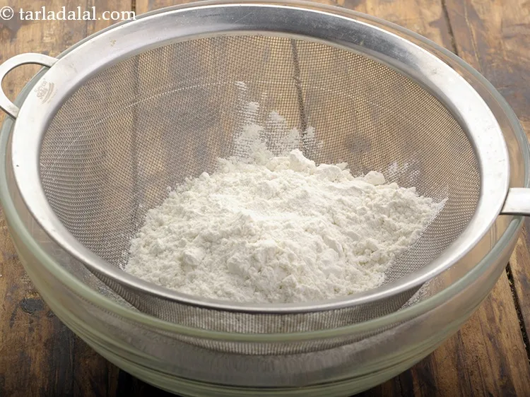 Step 27 – <strong>For the plain flour-cocoa mixture of eggless chocolate cake in pressure cooker recipe | eggless …