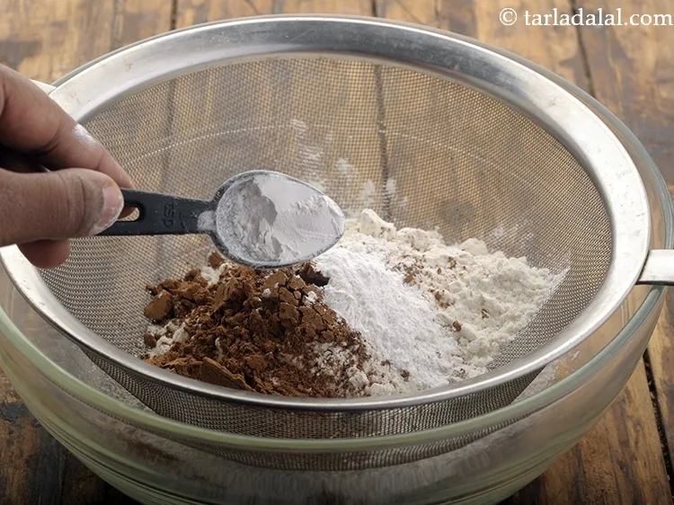 Step 29 – Add 1 1/2 tsp&nbsp;<a href="https://www.tarladalal.com/glossary-baking-powder-425i">baking powder</a>.